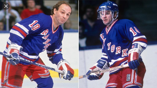 Guy Lafleur of the Quebec Nordiques skates on the ice as Tony Granato